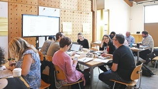 Professionals collaborating together